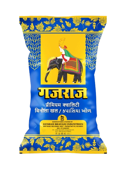 Golden-brown cattle feed pellets in large storage bags